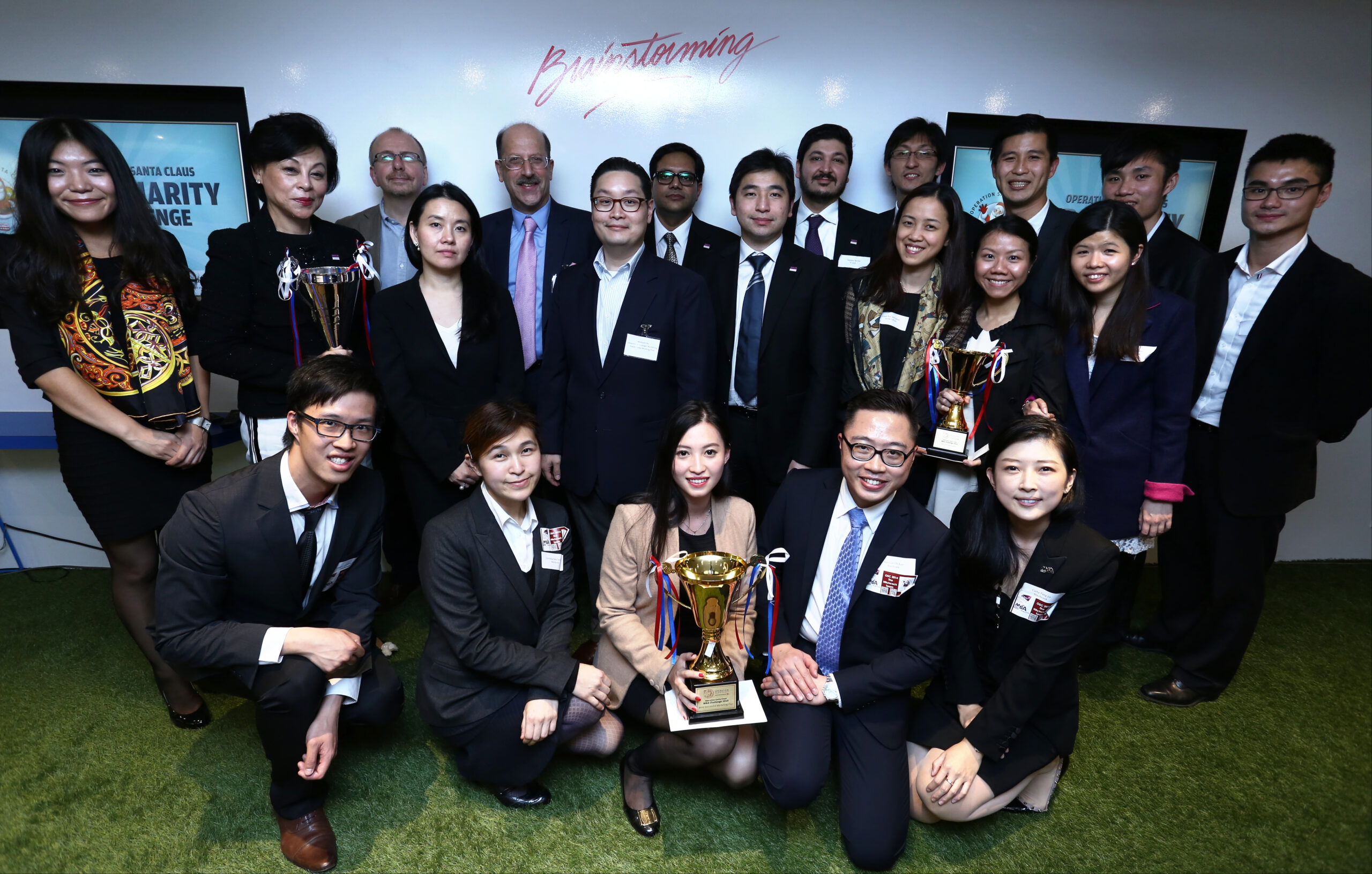 Winners and judges of the MBA Challenge 2014 OSC event, held at Blue Print Office in Quarry Bay. 06JAN15