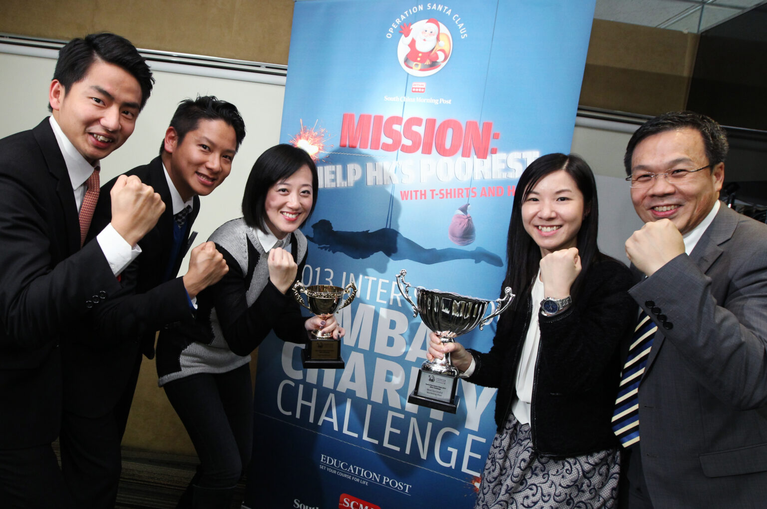 For OSC: Winning team of 2013 Inter-School MBA Charity Challenge, (L-R) Angus Au-Yeung Wai-kwong, Wesley Wong, Adriana Chan Chi-on, Sharon Mo and Angus Cheng Wing-hong from the University of Hong Kong (HKU) pose with their trophies. 14JAN14